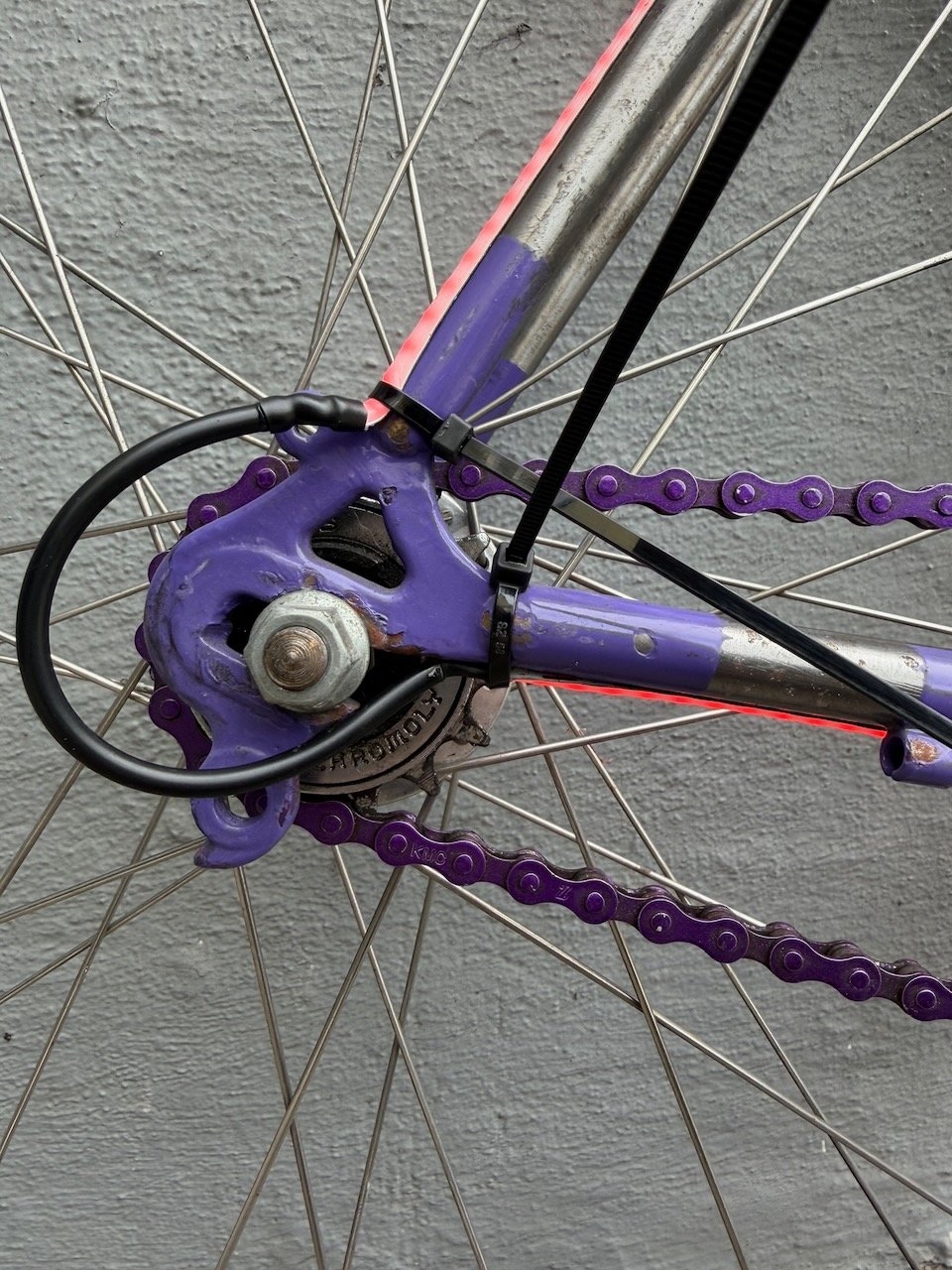 Zip ties securing LED strip to frame